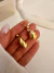 Par Aros Gotita Colgante Acero dorado (FANTASIA) - comprar online