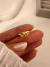 Earcuff Nudo Acero dorado