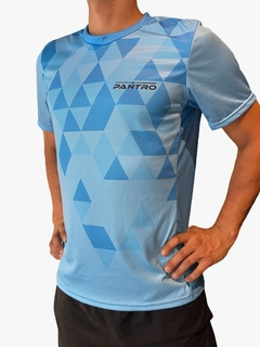 REMERA RUNNING DEPORTIVA UNISEX CELESTE - comprar online