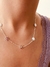 Collar cinco margaritas de acero blanco