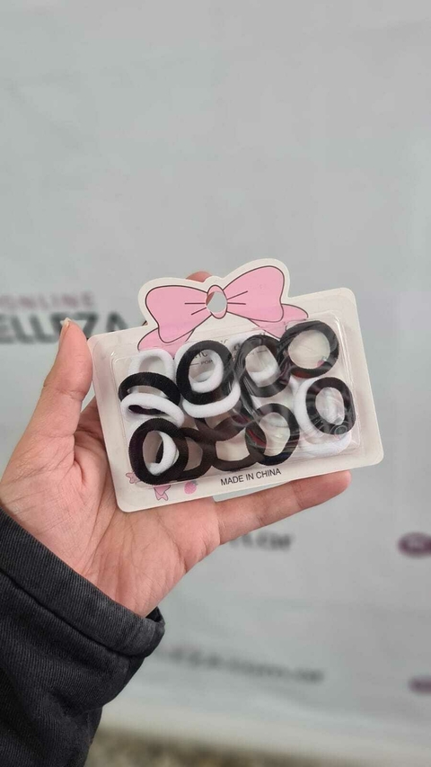 Colitas/gomitas blancas y negras pelo
