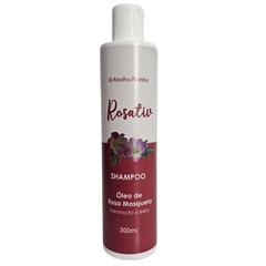 Frasco de shampoo Rosativ da Abelha Rainha com óleo de rosa mosqueta, 300ml, destacando hidratação e brilho.