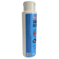 Frasco de shampoo vegano Intense Griffus com rótulo azul e informações sobre o produto.