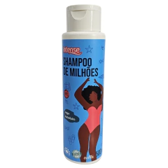 Frasco de shampoo de milhões da linha Intense Griffus, com design colorido e ilustração de uma mulher com cabelo crespo.