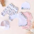 Conjunto Conejita Felicitas - bodie rosa MANGA LARGA - babero blanco