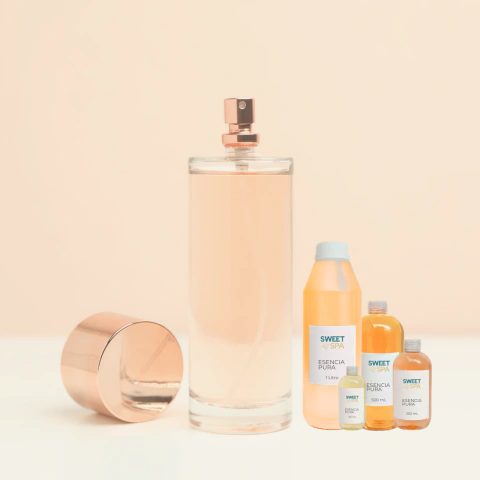Frasco transparente con esencias puras de perfumería fina en varios tamaños y tapa metálica dorada