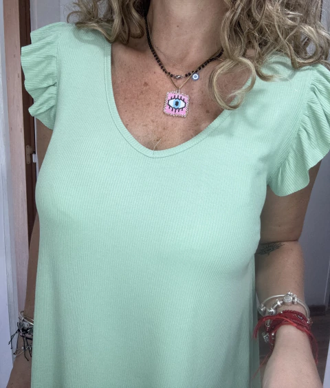 Musculosa Evasé con volado en internet