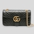 BOLSA GUCCI GG MARMONT MATELASSE PRETA GOLD PEQUENA