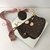 BOLSA MULTI POCHETTE COM ALCA ROSA na internet