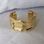 Bracelete dourado orgânico