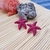 Brinco estrela do mar pink - tons variam