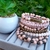 Mix de pulseiras Delux Gratidão nude/rosinha