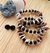 Conjunto preto cascalhos + brinco