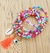 Mix de pulseiras colorido mod 2 com elos búzios/ olho grego e tassel
