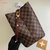 Bolsa Louis Vuitton Neonoé Ebene Vinho Italiana - comprar online