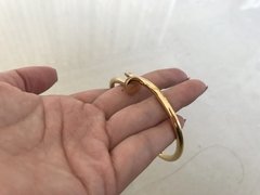 Pulseira Bracelete Cartier Prego Juste Un Clou Dourado Com Brilho na internet