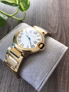 Cartier Ballon Bleu Fundo Branco Dourado Italiana na internet