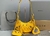 Bolsa Balenciaga Le Cagole XS Amarela Italiana