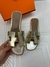 Rasteira Flat Hermes Oran Dourada Italiana na internet