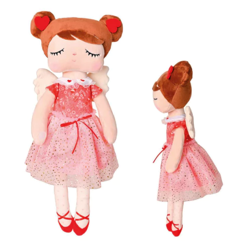 Boneca Metoo Doll Angela Fada Mia de pelúcia, vestida com vestido rosa decorado, asas de fada e laços vermelhos, mostrada de frente e de lado.