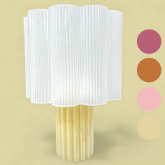 Luminária decorativa em formato de flor com cúpula translúcida e base amarela, ideal para iluminação de ambientes modernos.