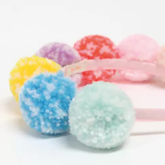 tiara-pompom-arco-iris-meri-meri