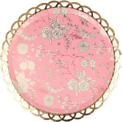 Prato de papel decorativo Meri Meri com estampa floral branca sobre fundo rosa e borda rendada dourada, ideal para festas elegantes.