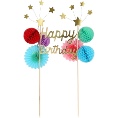 Toppers para bolo Happy Birthday com estrelinhas da Meri Meri decorando um bolo de aniversário colorido em uma mesa de festa temática de circo.