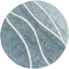 Tapete redondo lavável Montanhas Vintage Blue de 160cm da Lorena Canals, com design em tons de azul e detalhes em linhas brancas.