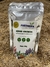Pacote de adubo orgânico Fortirriza para orquídeas e plantas, com informações sobre nutrientes e peso de 50g.