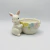 Enfeite Páscoa cerâmica Coelho Decorativo com Cesta Colorido 18,5x13,5x13cm