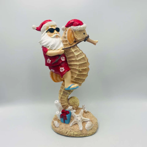Papai Noel na Praia em Resina Cavalo Marinho 30,5x17,5cm