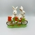 Enfeite em resina Páscoa Coelho na Bicicleta 23x7cm - Patricia Kelly Home Decor