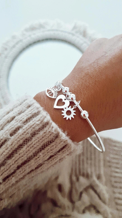 Esclava dijes ojo/corazon/sol - comprar online