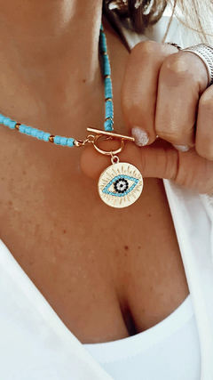 Collar acqua eye gold en internet