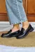 OSSIRA NEGRO LISO SS25 - comprar online