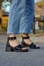 Imagen de ULI NEGRO SS25