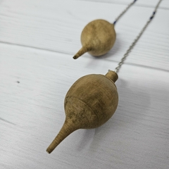Péndulo de madera esférico