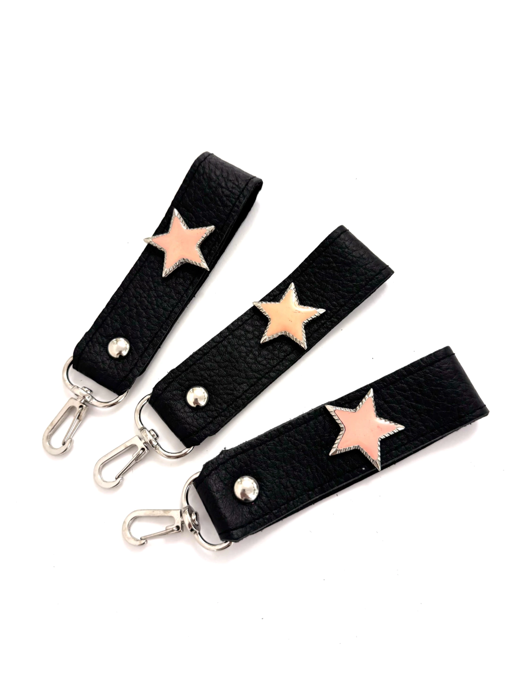 llavero matilda negro flotter con estrella coral