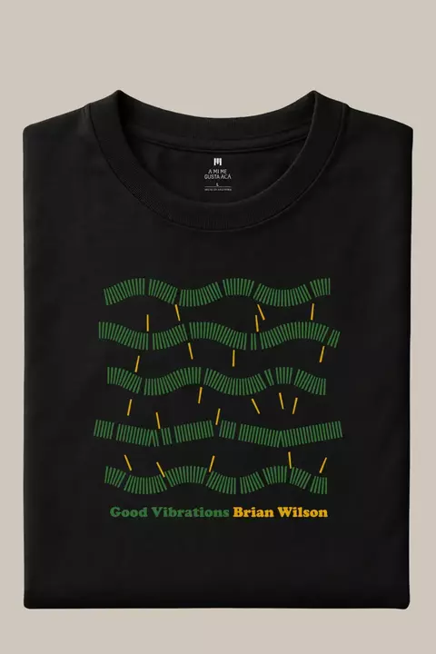 Remera negra con diseño gráfico verde y amarillo y texto "Good Vibrations Brian Wilson"