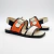 Sandalia de cuero combinada en manteca y naranja. Modelo Cancún de Las Boleras.