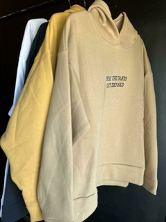 BUZO FRIZADO CON CAPUCHA PRAY THE FAKES - comprar online