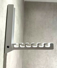 Perchero de pared plegable blanco en internet