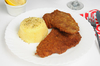 Milanesas de carne con puré