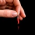 DIJE CUERNO EN CORAL ROJO Y PLATA 925 - comprar online