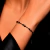 PULSERA 7 NUDOS BLACK 3 OROS 18K en internet