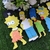 3148 - Gravatas e gargantilhas Simpsons M pacote com 10 unidades na internet