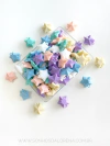 PINGENTES DE ESTRELAS COLORIDAS COM 10 GRAMAS