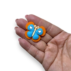 APLIQUE EMBORRACHADO BORBOLETA PESPONTADA LARANJA E AZUL (2 UNIDADES) na internet