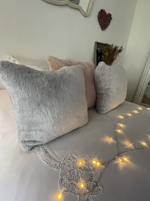 Almohadón corderito gris